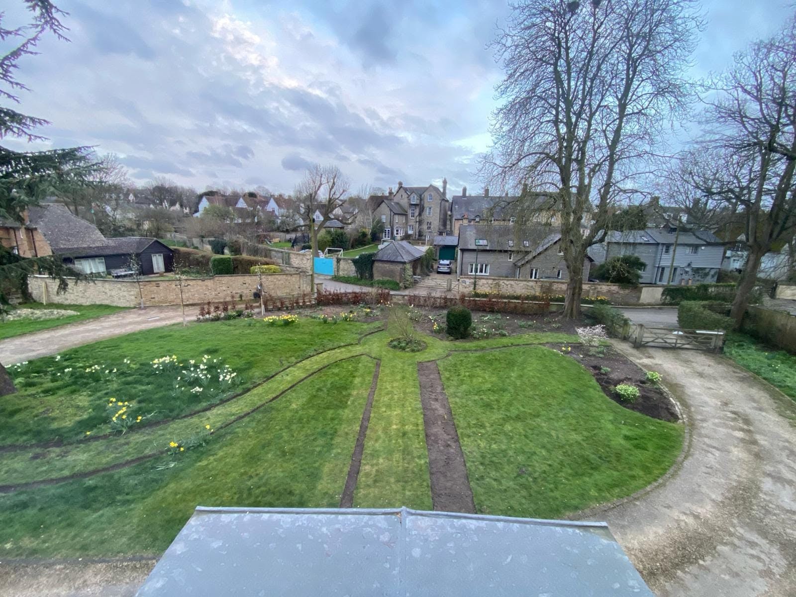 Crisply edged lawn beds in a formal garden